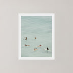 Fine photography artwork of people on surfboards in the water in Byron Bay.