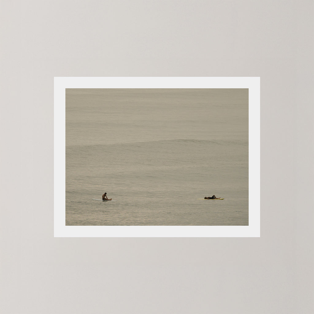 Ocean Therapy art print of two surfers on a calm ocean at Byron Bay, Australia.