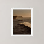 Wave Appreciation unframed art print of Bronte, Sydney with waves and cliffs displayed on a plain wall.